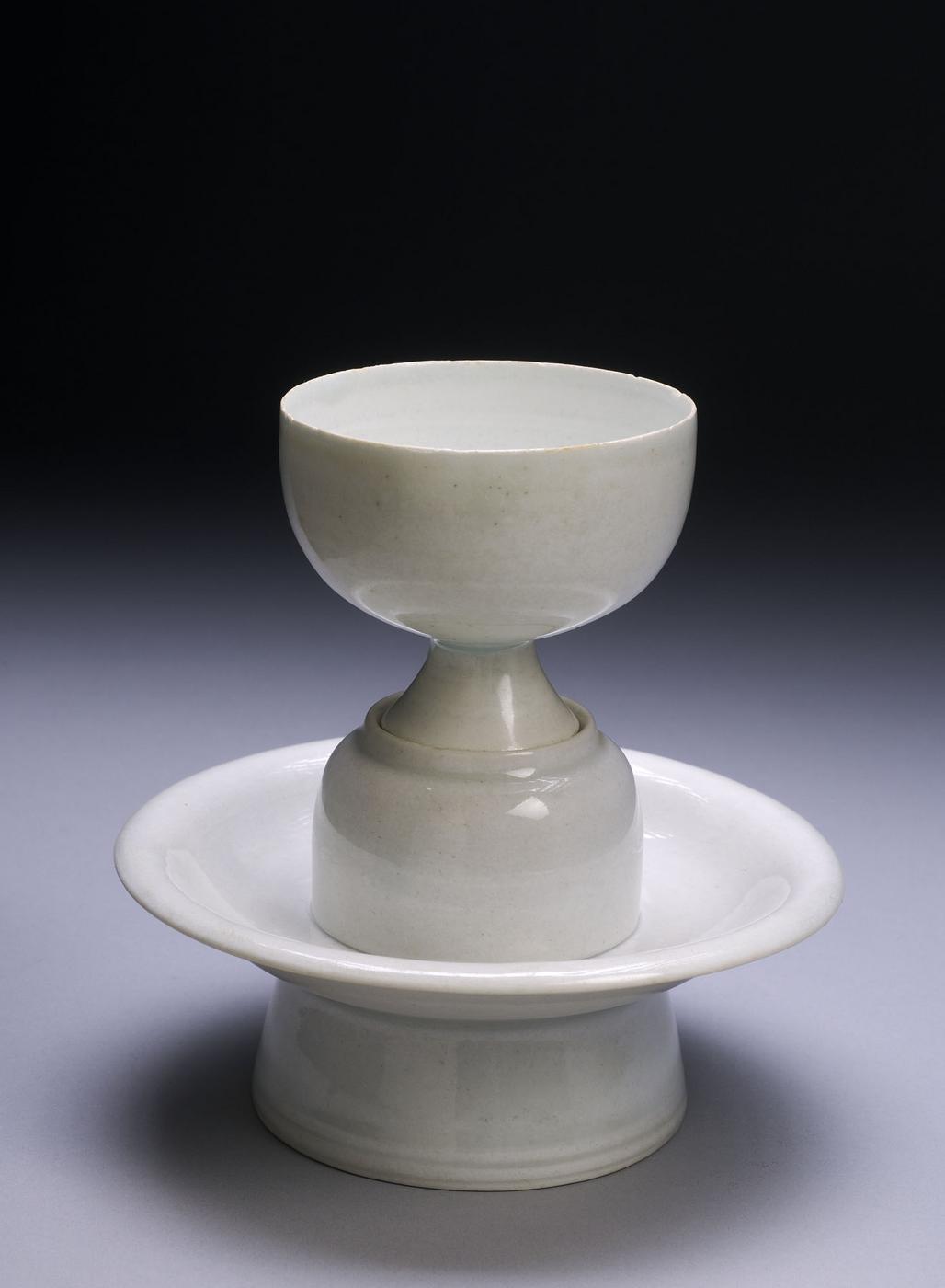 Photograph of 12-13th century white porcelain cup on a pedestal from the Song dynasty.