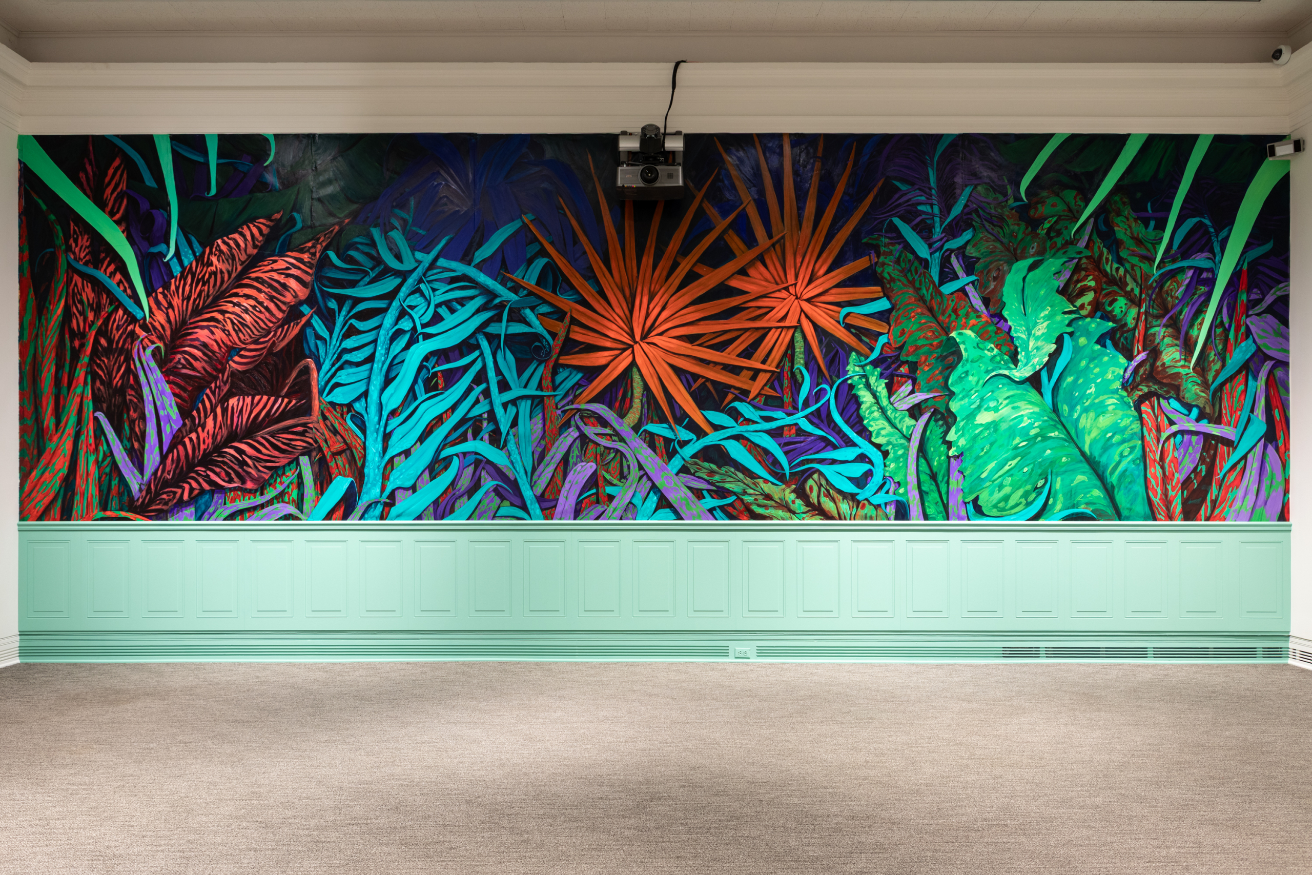 Photograph of ART& installation of Phaan Howng's Against Nature painting across wall.